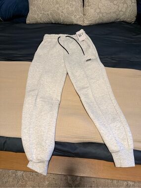 Nike Light Grey Kids Fleece Joggers with Black Drawcord